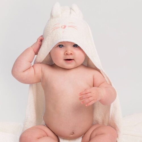 Baby wearing Tiny Chipmunk bamboo hooded towel - pink