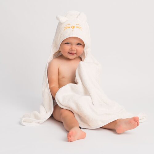 Baby wearing Tiny Chipmunk bamboo hooded towel - yellow